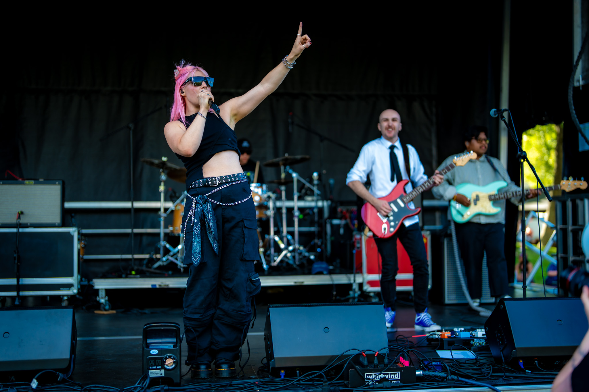 Singer leading an outdoor set at Bite of Seattle