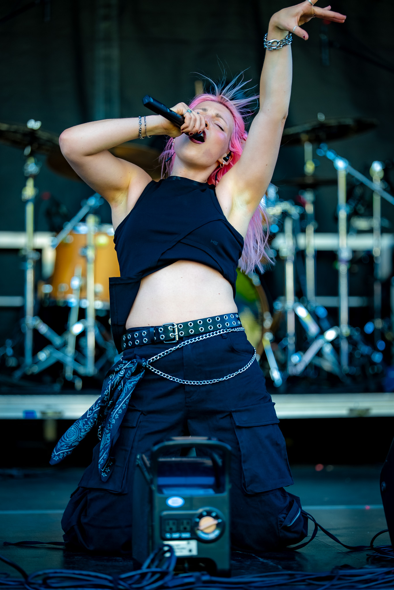 Singer reaching through a festival performance