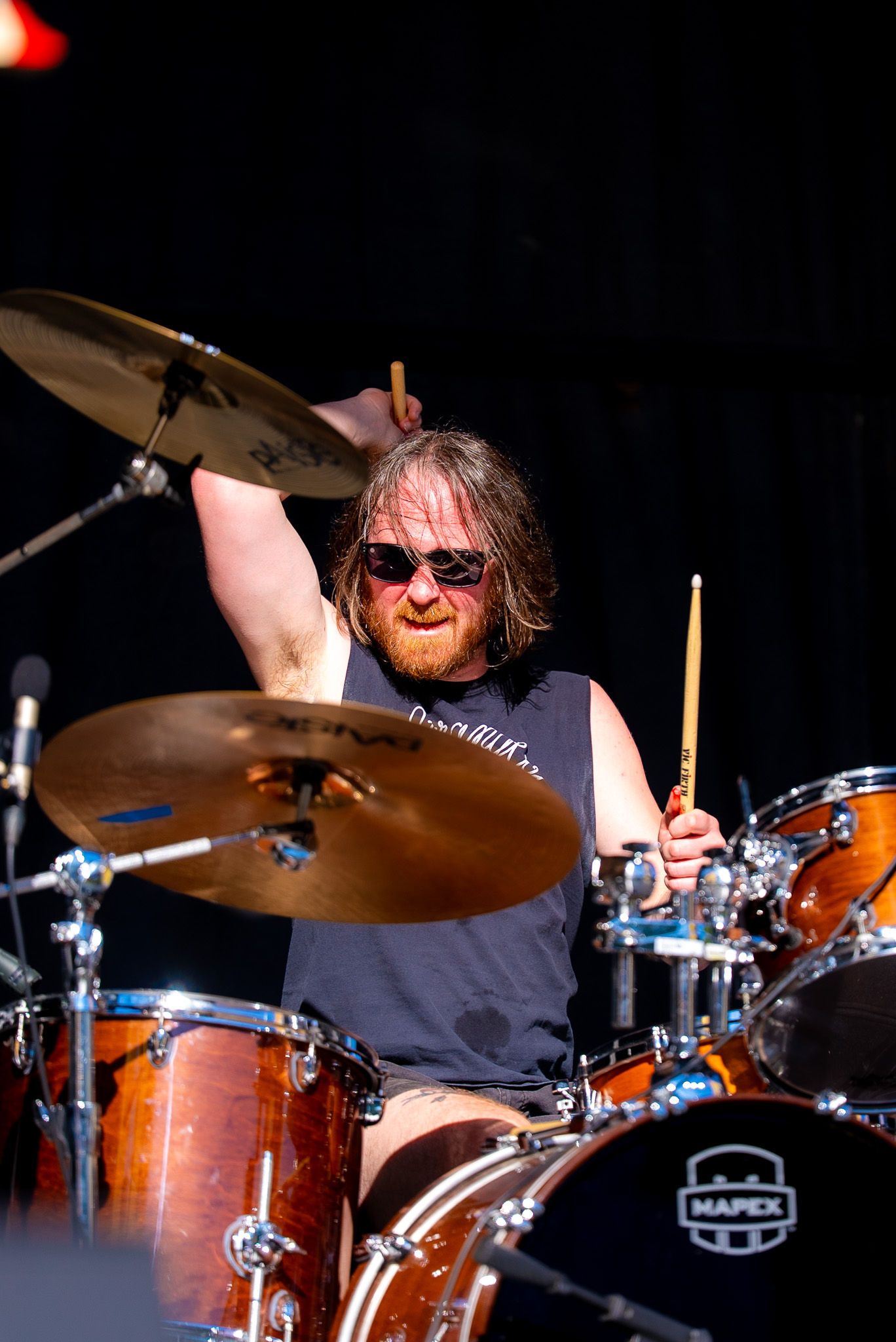 Drummer seen from the edge of the stage