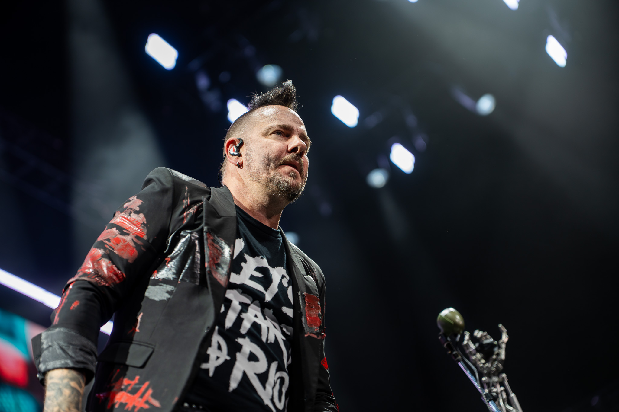 Three Days Grace performing through a chorus