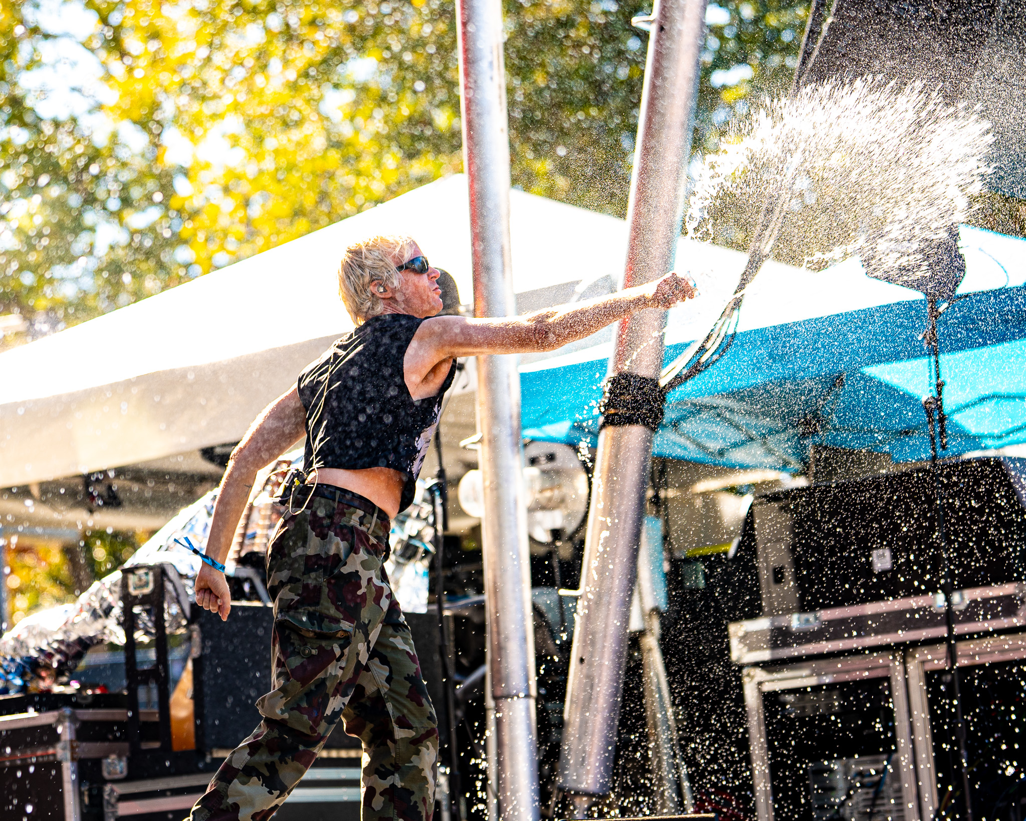 Water exploding across the stage during Sextile's performance