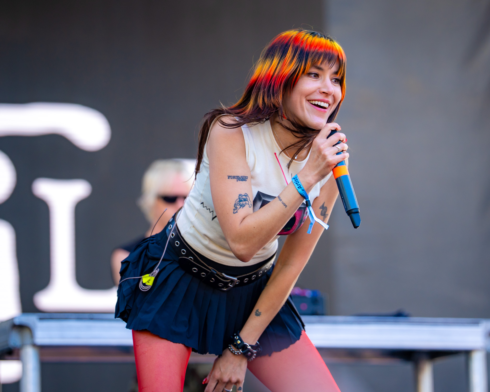 Melissa Scaduto of Sextile smiling toward the crowd