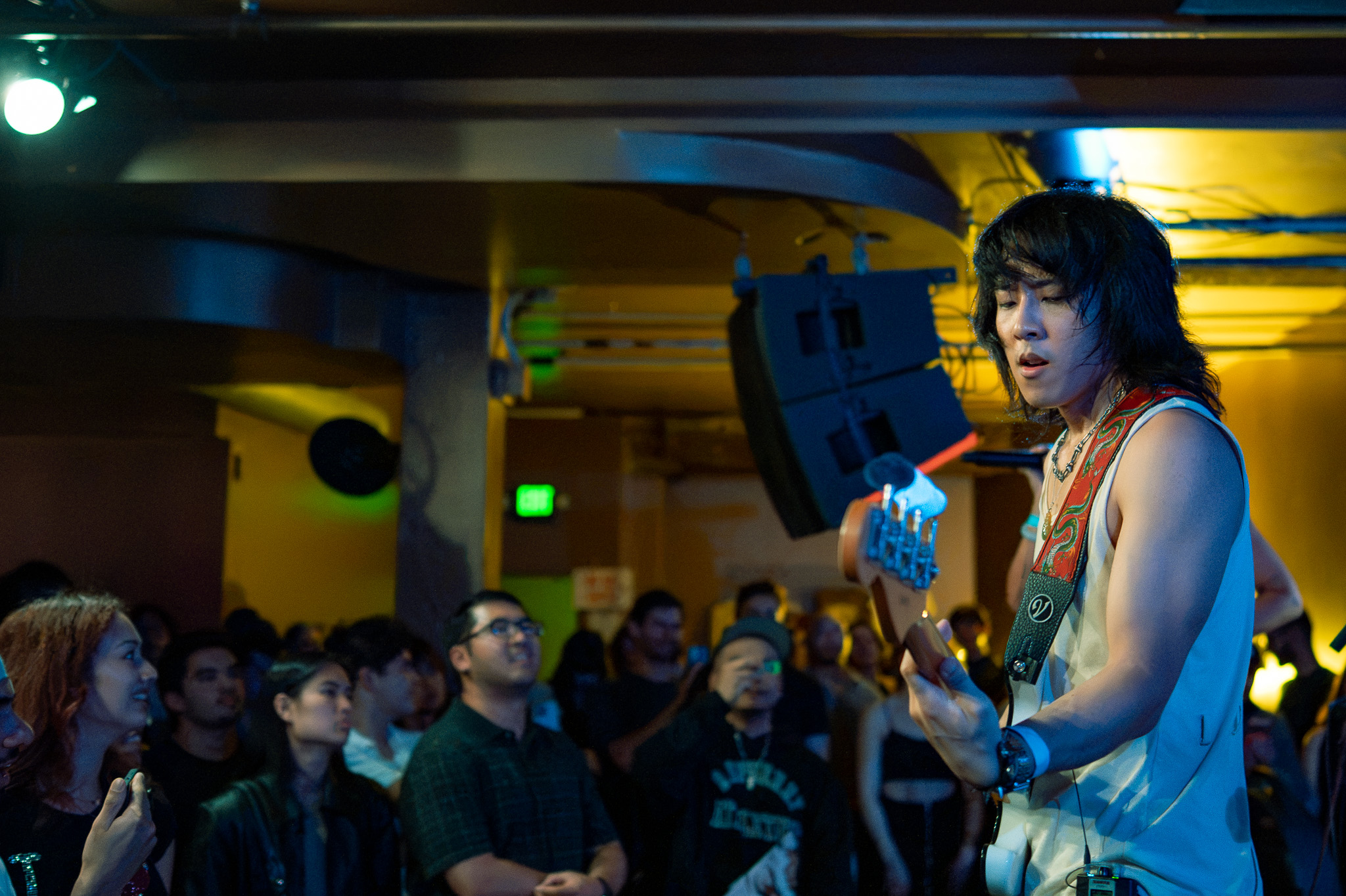 A CHANPAN guitarist plays at the edge of the Barboza crowd