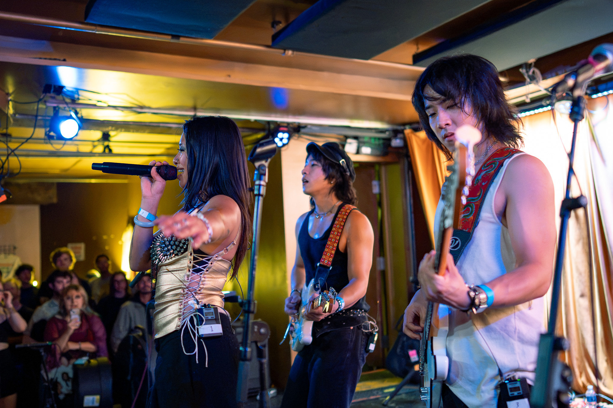 CHANPAN perform together with the Barboza crowd visible beside the stage