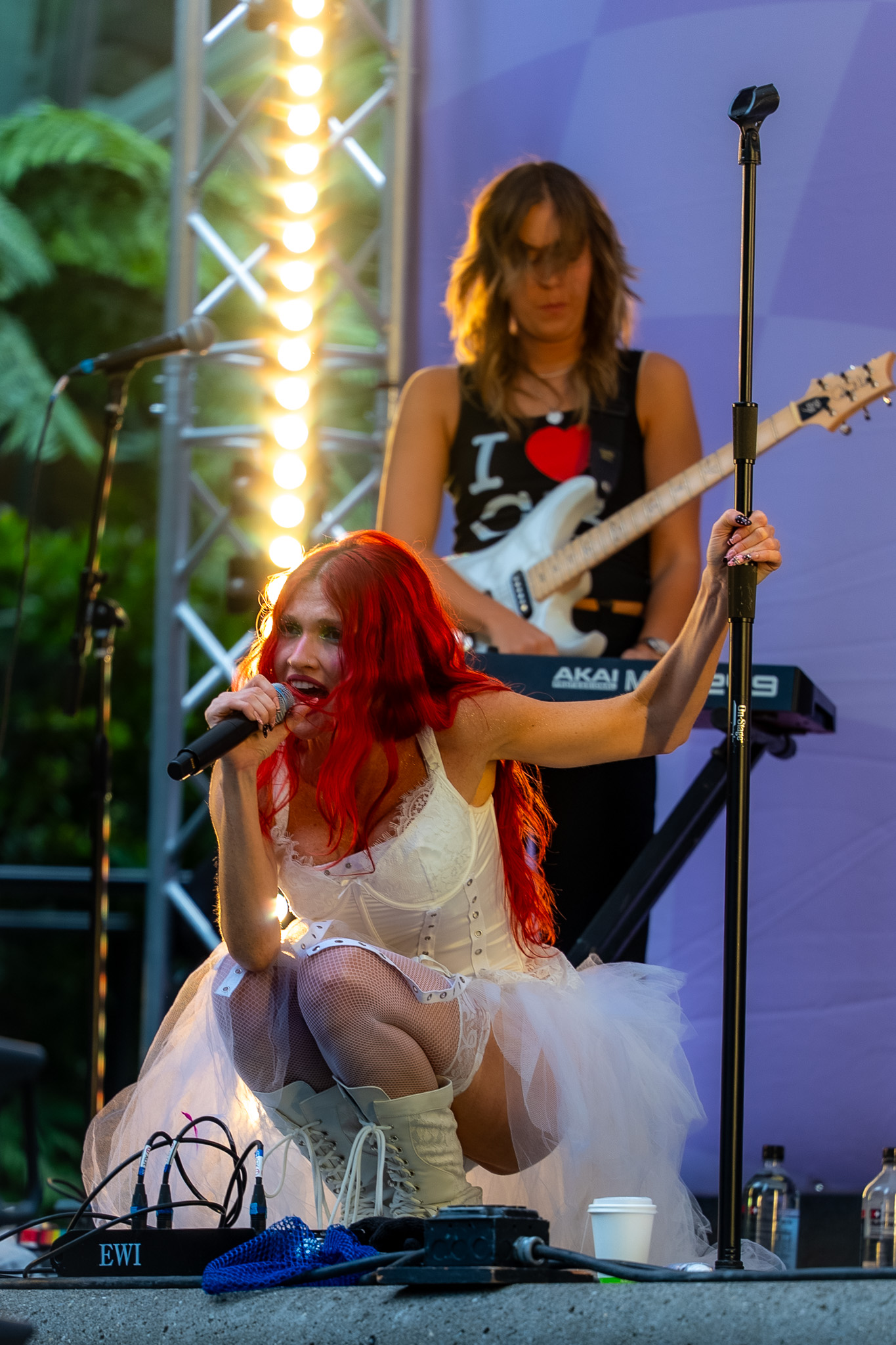 Cherry Bomb onstage in white