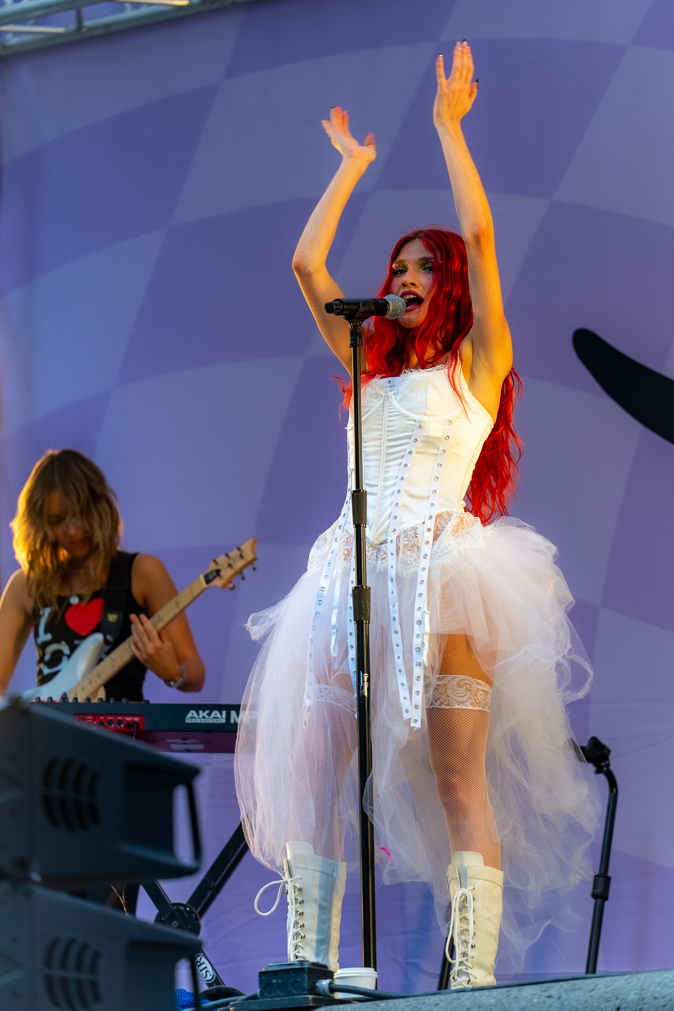 Cherry Bomb under lavender stage light