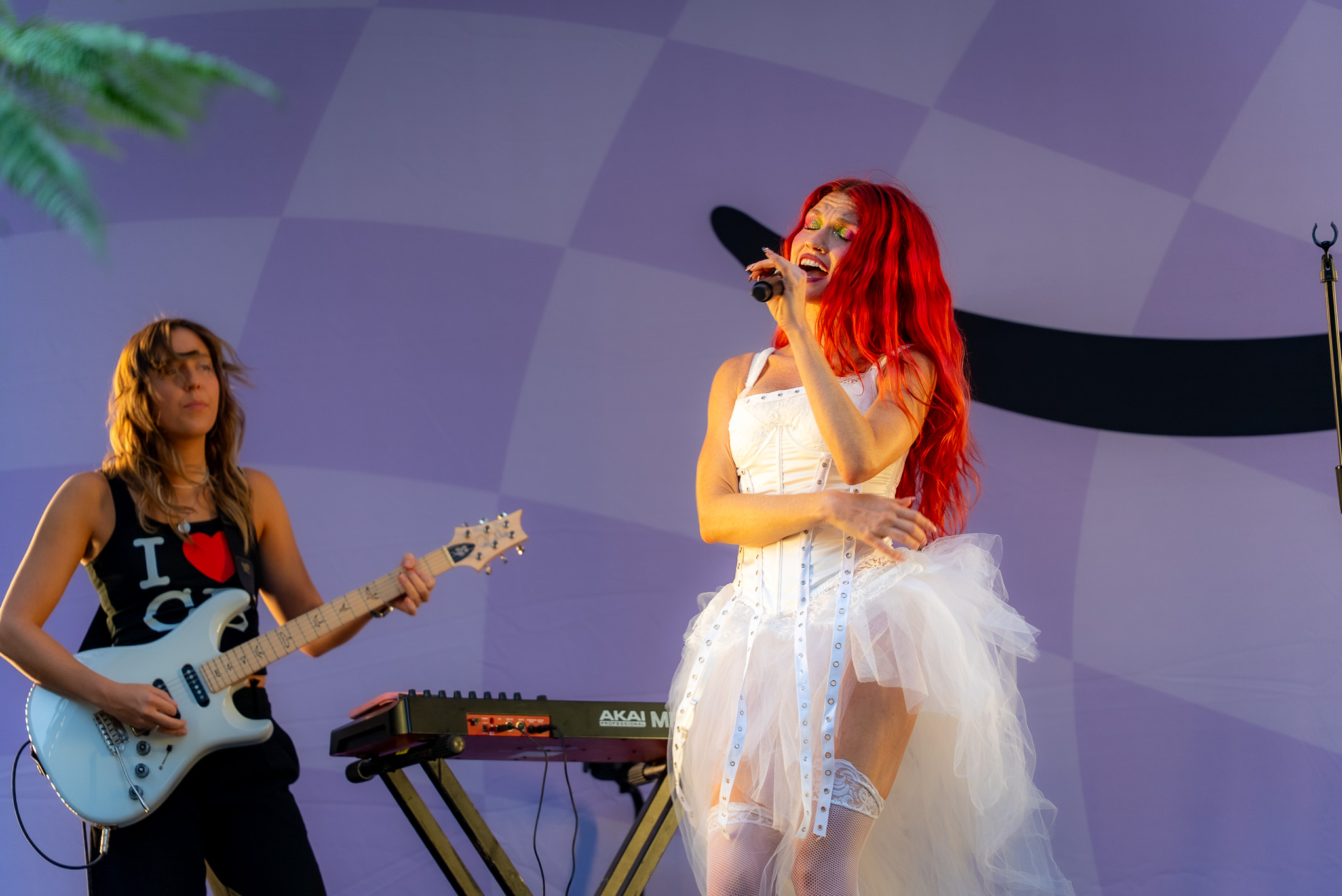 Mandy Lee performing as Cherry Bomb in a wide frame