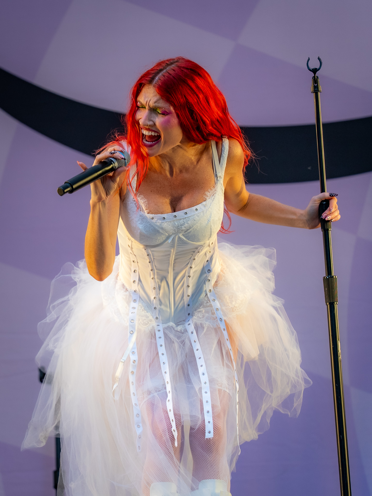 Cherry Bomb photographed full length onstage