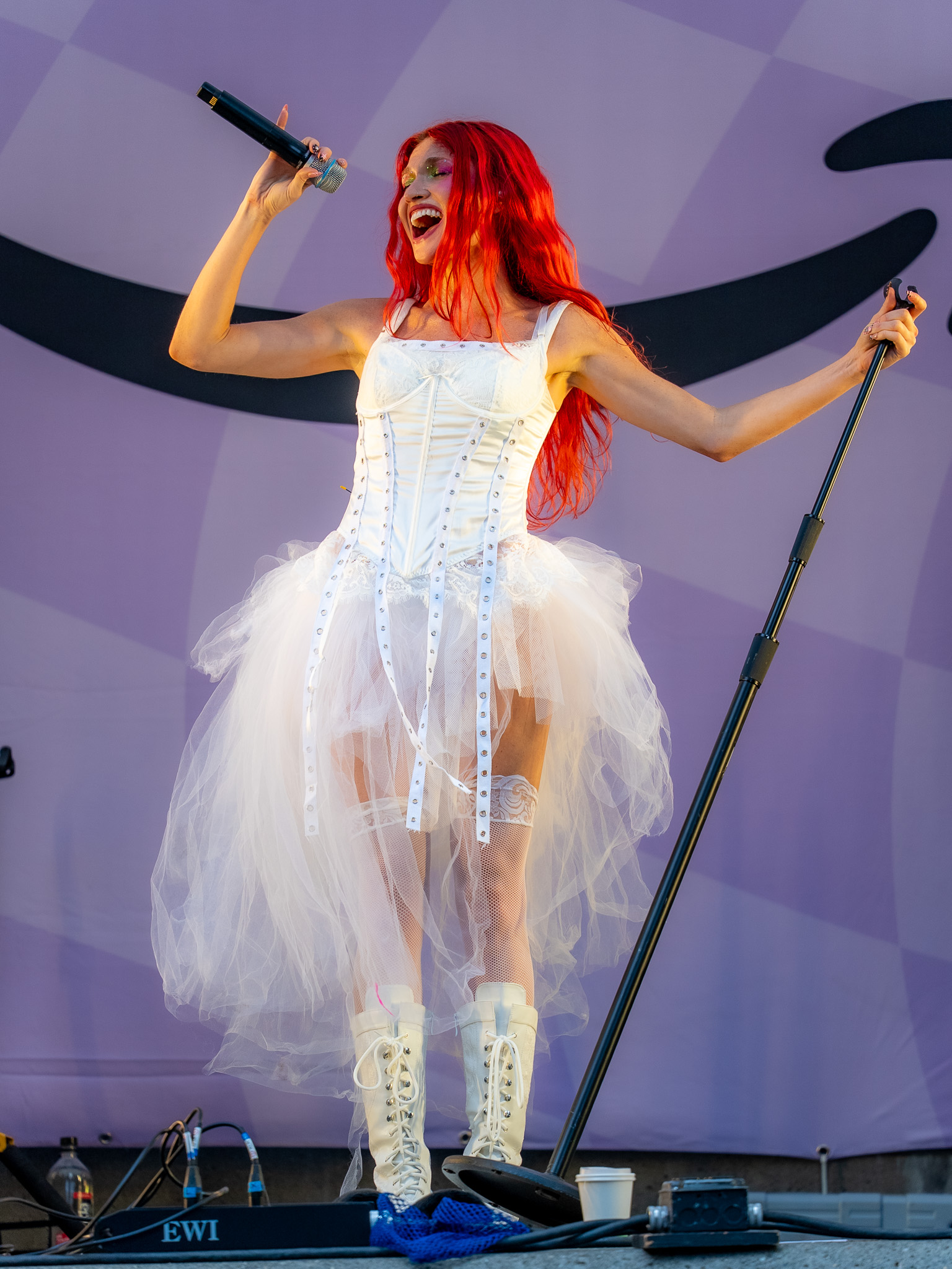 Cherry Bomb smiling into the microphone
