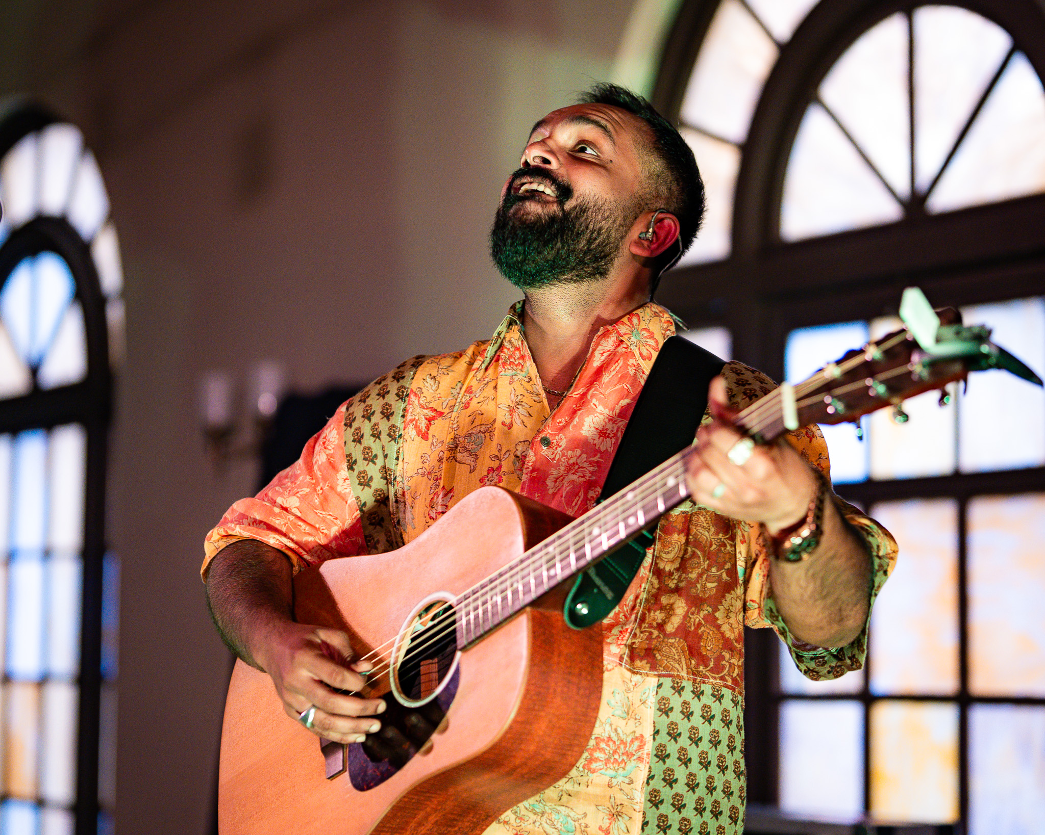 When Chai Met Toast performing in front of the arched windows at Fremont Abbey